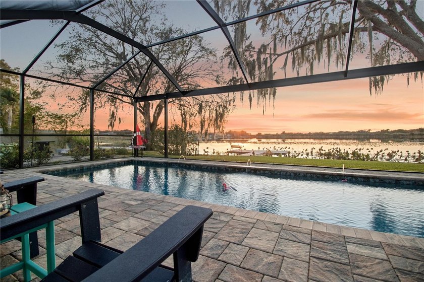 Lakefront living with a proper sunset! Down a private road with - photo 43