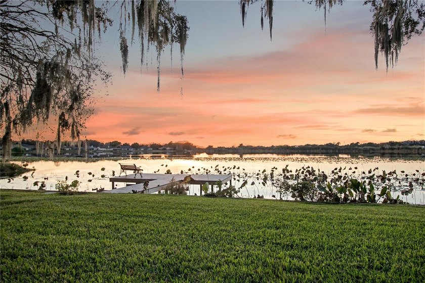 Lakefront living with a proper sunset! Down a private road with - photo 45