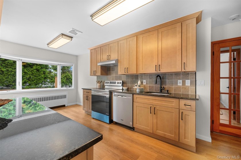 Charming and lovingly maintained wide-line Ranch nestled in - photo 13
