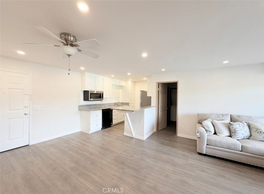 Welcome to this spacious, light-filled condo in the heart of - photo 3