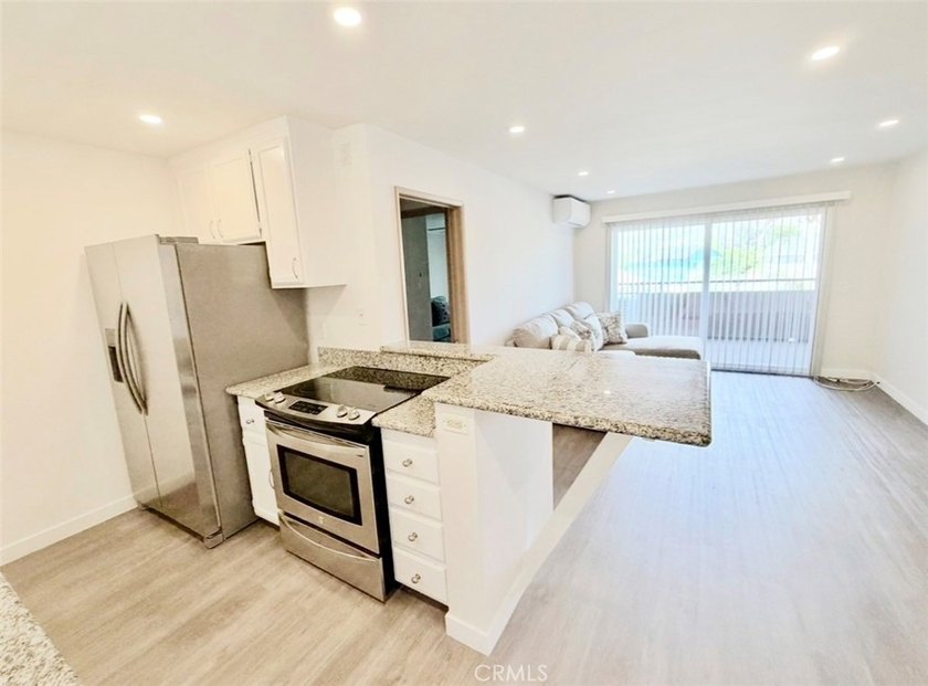 Welcome to this spacious, light-filled condo in the heart of - photo 8