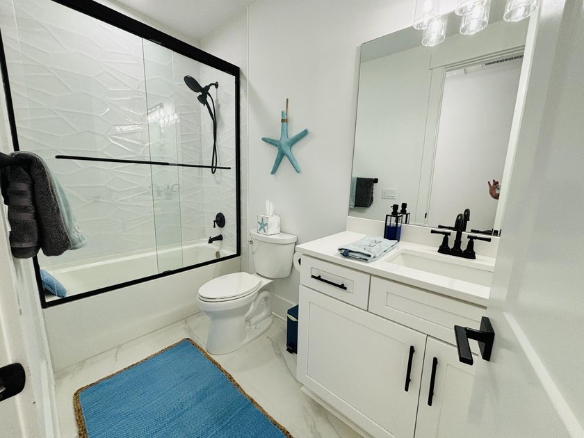 Discover the perfect blend of coastal charm and modern luxury at - photo 31