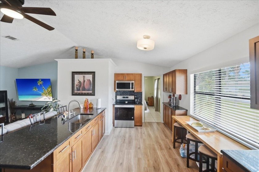 Welcome home to this beautifully maintained and thoughtfully - photo 12
