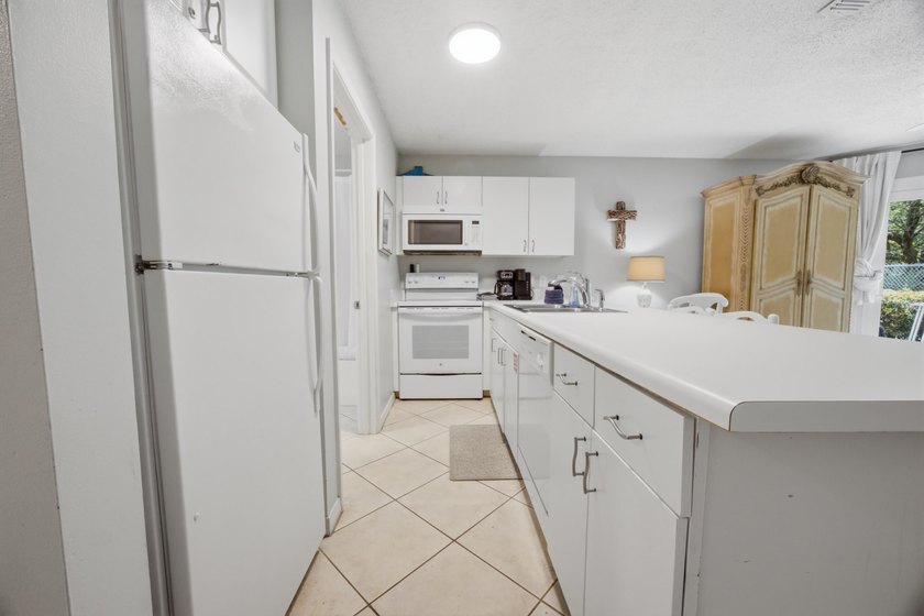 Welcome to this charming ground floor Gulfview condo. Such - photo 22