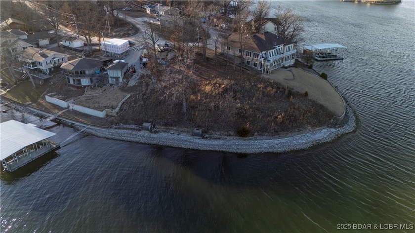 This rare double lakefront lot offers unbeatable panoramic views - photo 7