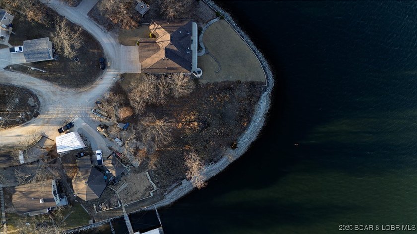 This rare double lakefront lot offers unbeatable panoramic views - photo 10