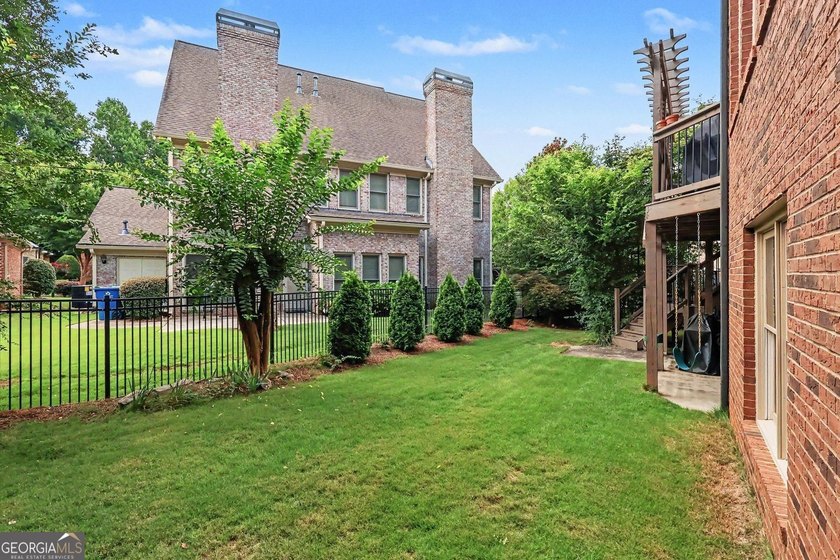 Welcome to this stunning 6-bedroom, 4-bathroom home located in a - photo 48