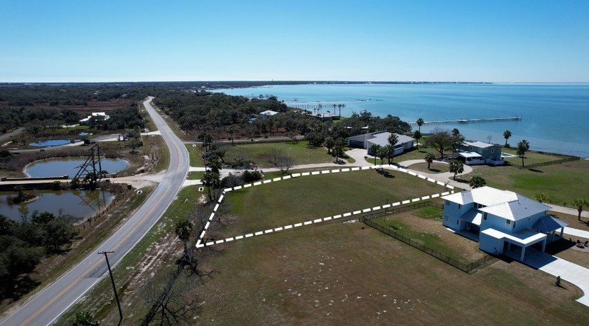 The Landing at Redfish Point is a gated coastal enclave where - photo 4