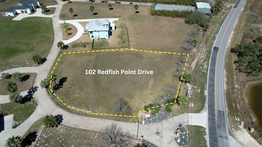The Landing at Redfish Point is a gated coastal enclave where - photo 6
