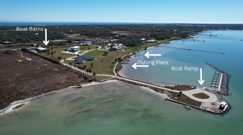 The Landing at Redfish Point is a gated coastal enclave where - photo 8
