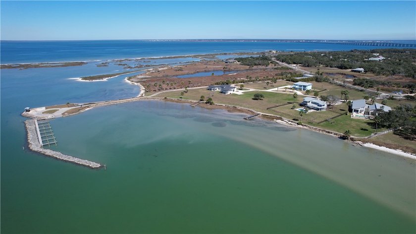 The Landing at Redfish Point is a gated coastal enclave where - photo 10