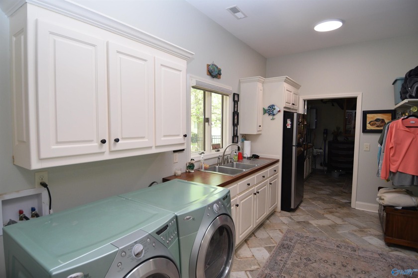 Stunning Remodeled Main Channel Waterfront Home boasting 209+/- - photo 21