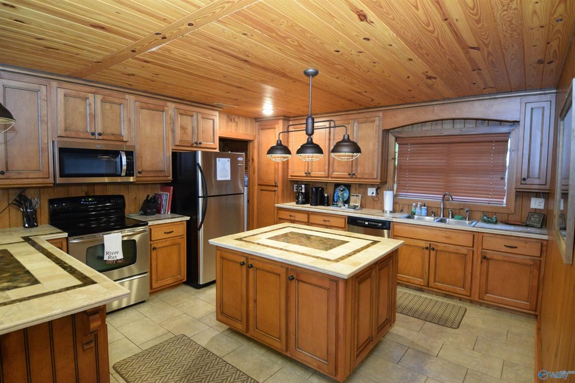 Stunning Remodeled Main Channel Waterfront Home boasting 209+/- - photo 24