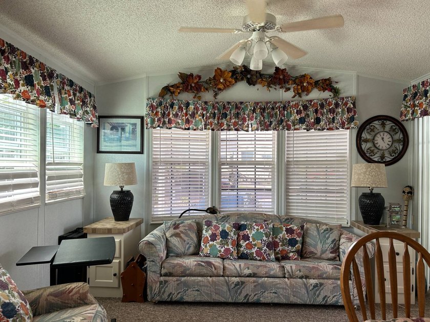 Furnished Park Model with addition, RV hookups and newer golf - photo 3