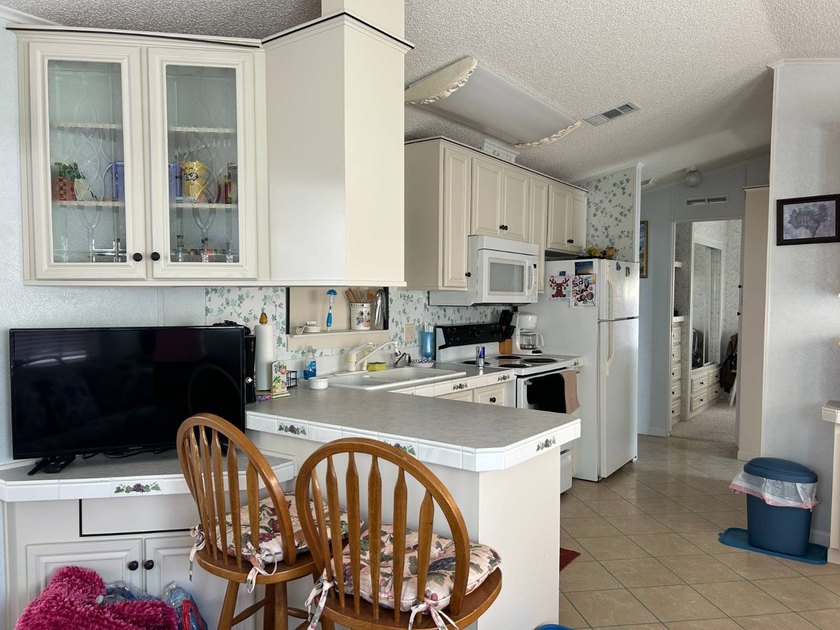Furnished Park Model with addition, RV hookups and newer golf - photo 6