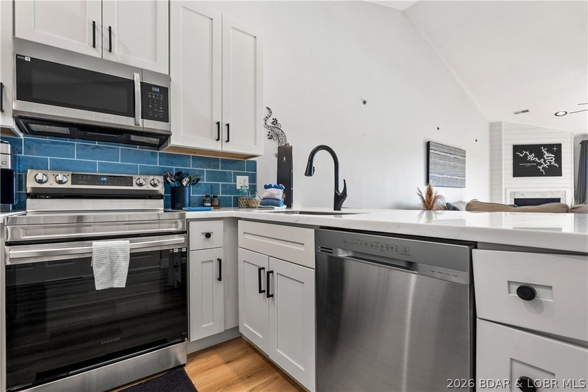 If you've been searching for a modern lakefront escape with a - photo 11