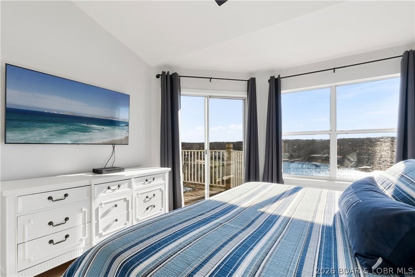 If you've been searching for a modern lakefront escape with a - photo 16