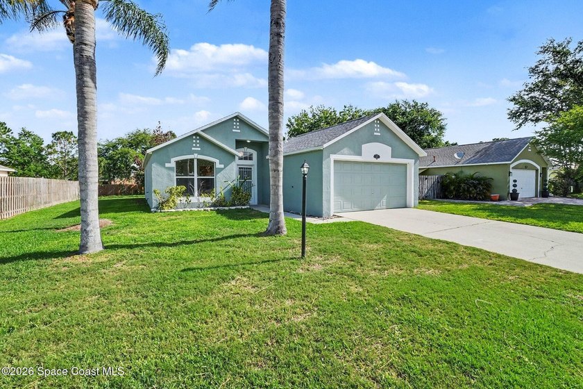 Check out this 3-bedroom, 2-bath home offers a spacious and airy - photo 2