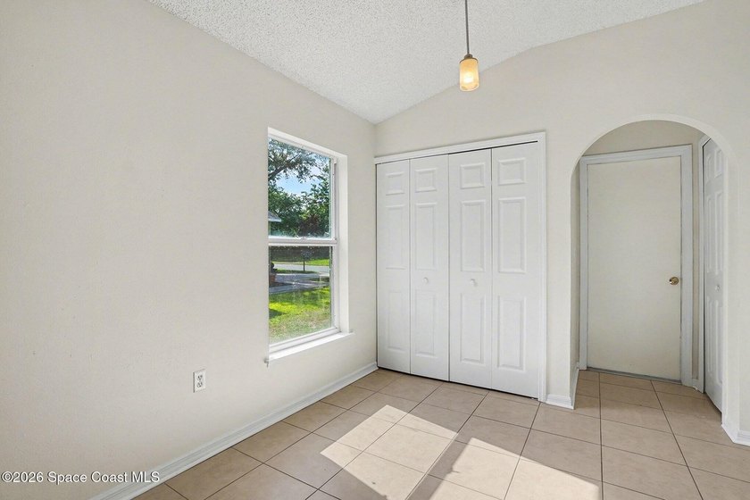 Check out this 3-bedroom, 2-bath home offers a spacious and airy - photo 6