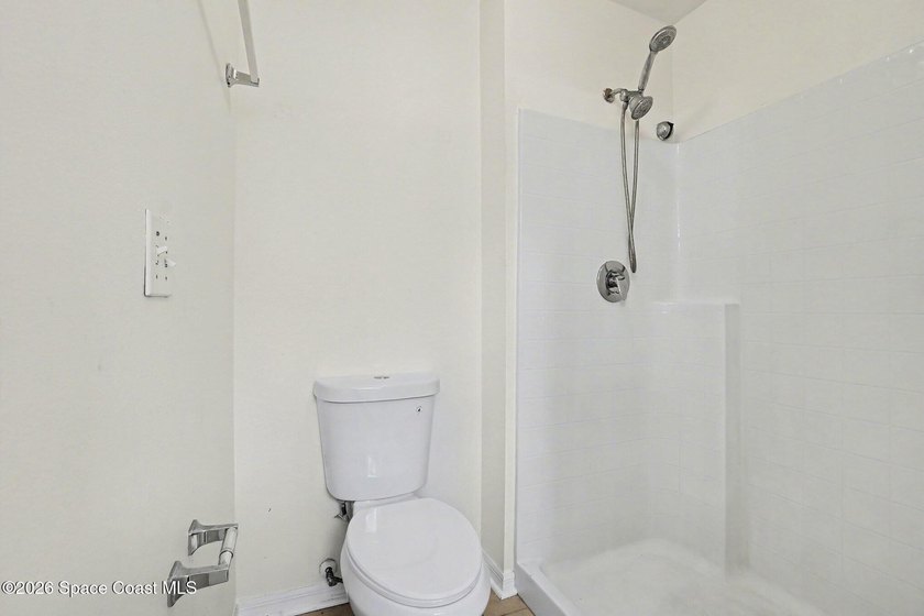 Check out this 3-bedroom, 2-bath home offers a spacious and airy - photo 9