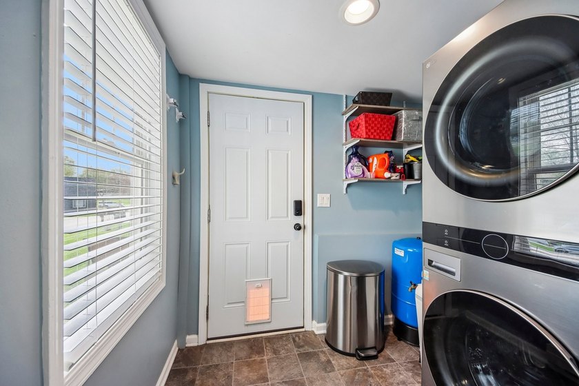 FULLY RENOVATED in 2023, this 3-bedroom home on a corner lot - photo 14