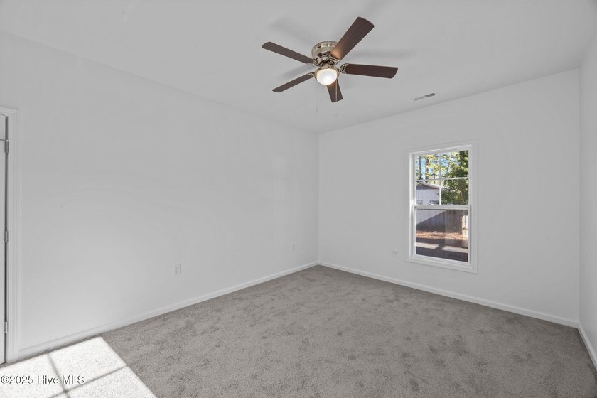 NEW CONSTRUCTION on a spacious corner lot in an unbeatable - photo 31