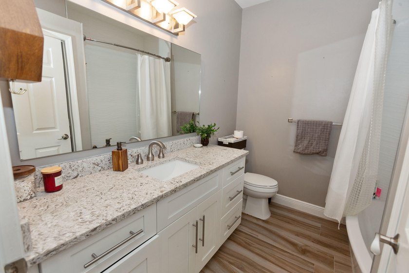 Totally Renovated, Customized, Highly Desired First Floor Condo - photo 19