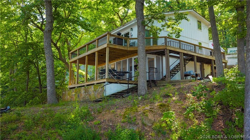 Tucked away on 2.33 lakefront acres, 33400 Kings Way Road offers - photo 20