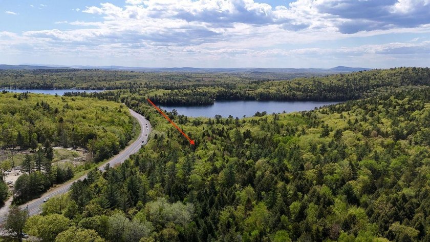 Large undeveloped lot with approximately 1700' on Acadia Highway - photo 4