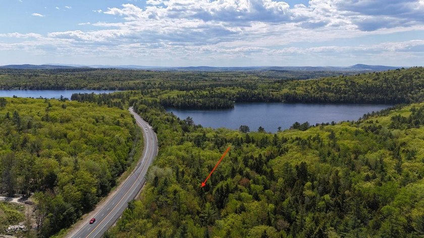 Large undeveloped lot with approximately 1700' on Acadia Highway - photo 7