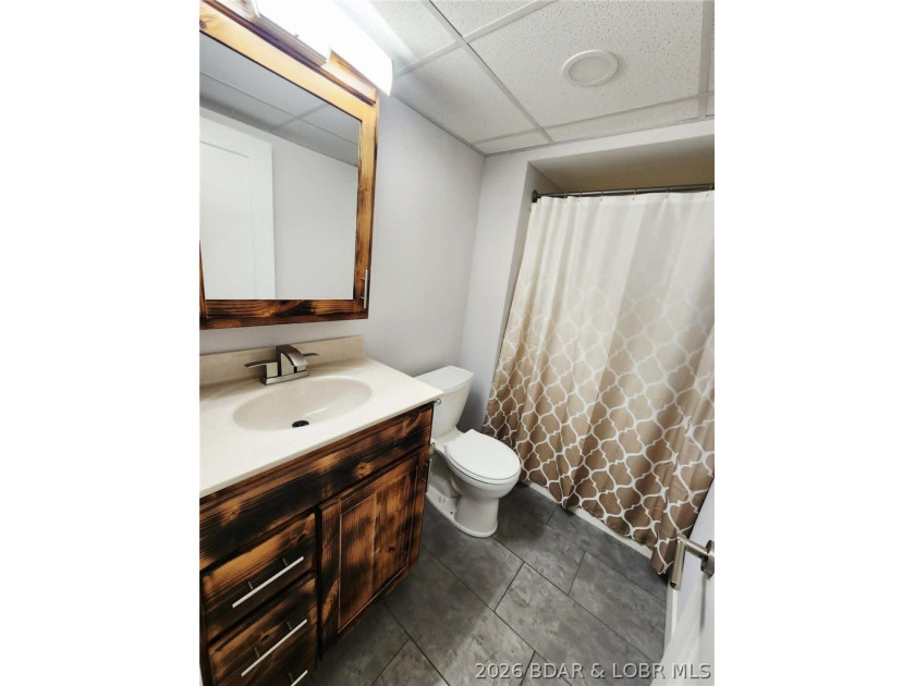 Enjoy lake life at its best with this charming 1 bedroom, 1 - photo 11