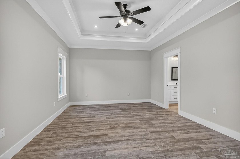 This newly built home is conveniently situated just minutes from - photo 4