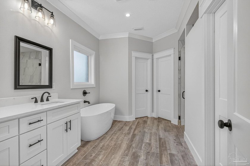 This newly built home is conveniently situated just minutes from - photo 5