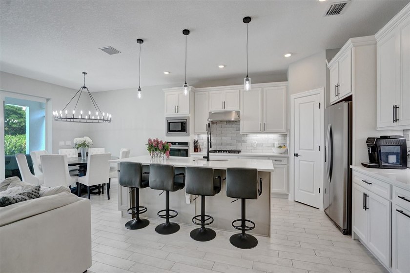 Windsong Estates almost new beauty, 5 bedrooms and 4 full baths - photo 11