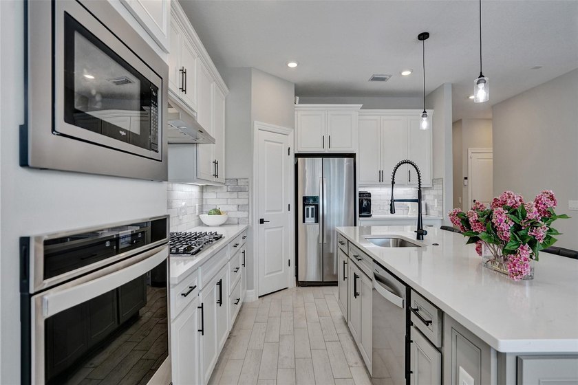 Windsong Estates almost new beauty, 5 bedrooms and 4 full baths - photo 18