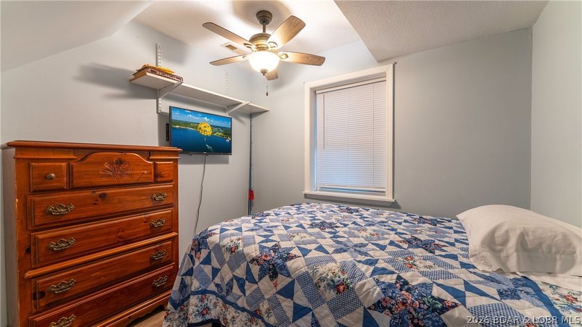 Located at the 43 MM, this lakefront property offers 75' of - photo 15