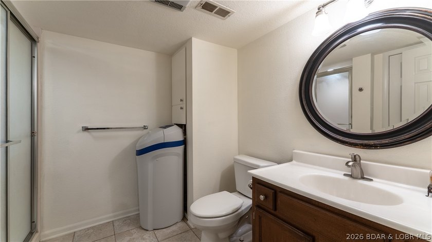 Located at the 43 MM, this lakefront property offers 75' of - photo 16