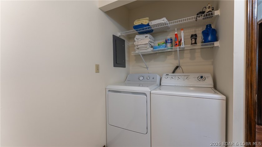 Located at the 43 MM, this lakefront property offers 75' of - photo 18