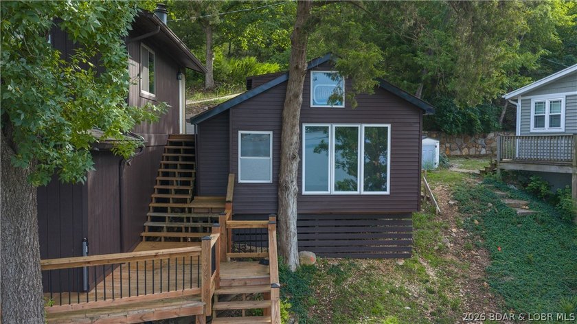 Located at the 43 MM, this lakefront property offers 75' of - photo 21