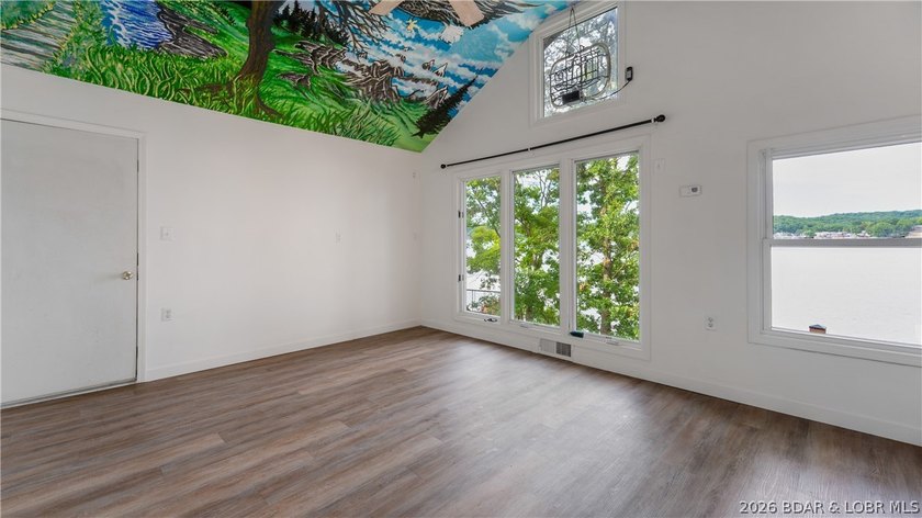 Located at the 43 MM, this lakefront property offers 75' of - photo 22