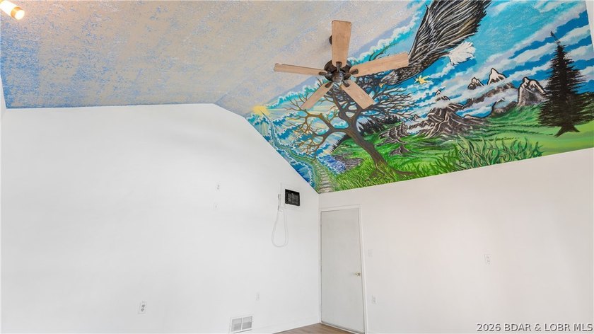 Located at the 43 MM, this lakefront property offers 75' of - photo 25