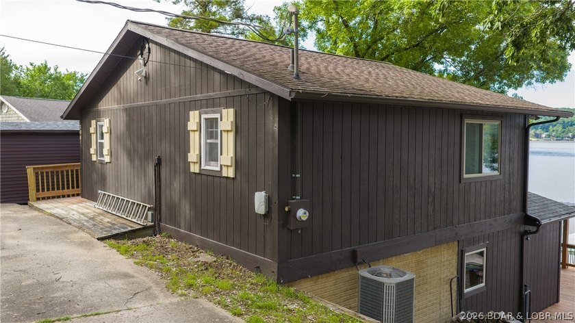 Located at the 43 MM, this lakefront property offers 75' of - photo 26