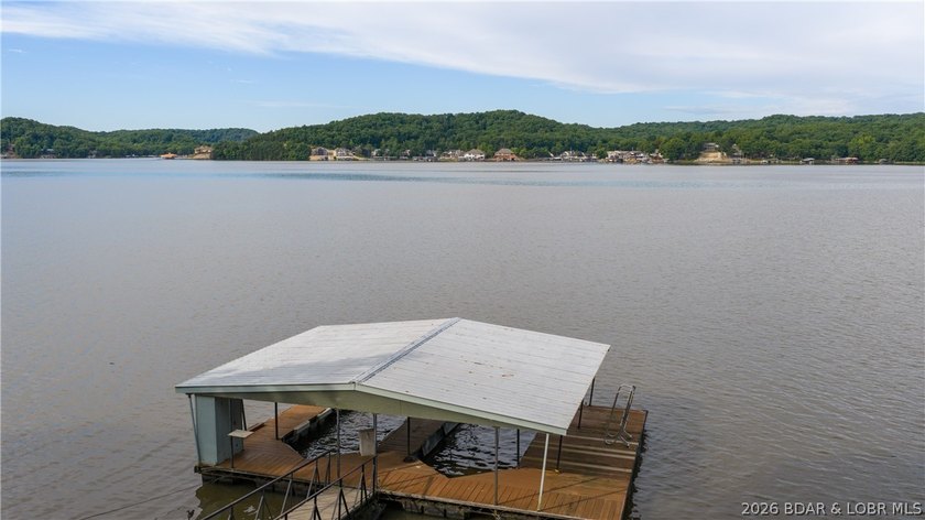 Located at the 43 MM, this lakefront property offers 75' of - photo 29