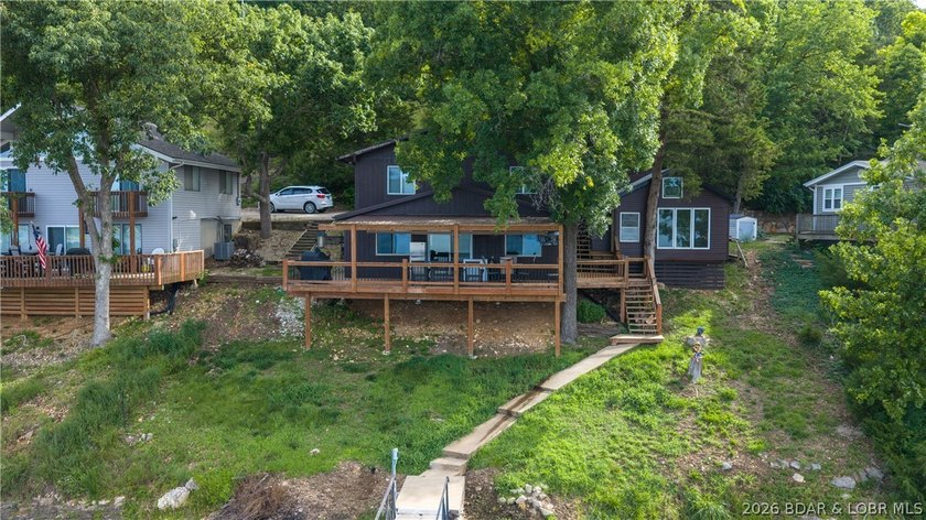 Located at the 43 MM, this lakefront property offers 75' of - photo 32