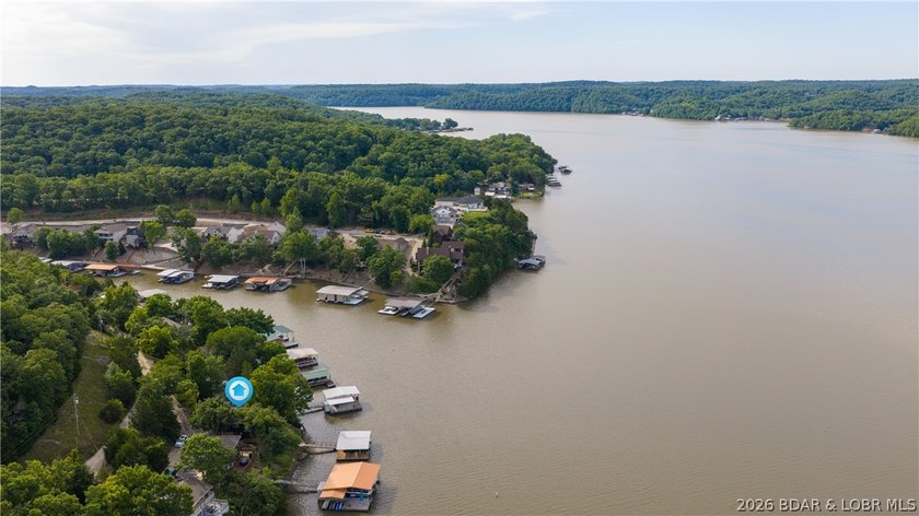 Located at the 43 MM, this lakefront property offers 75' of - photo 36