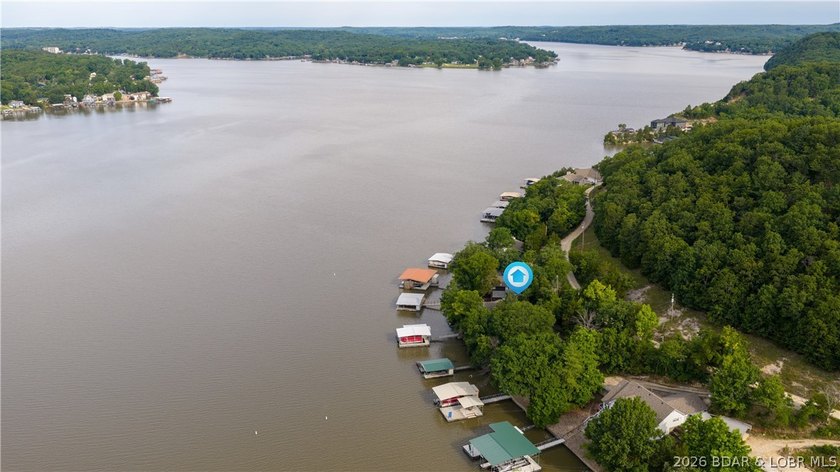 Located at the 43 MM, this lakefront property offers 75' of - photo 38