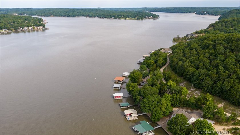 Located at the 43 MM, this lakefront property offers 75' of - photo 39