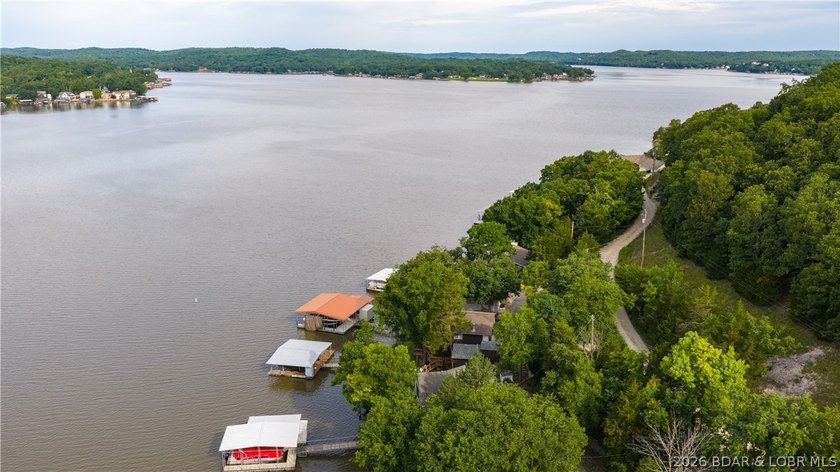 Located at the 43 MM, this lakefront property offers 75' of - photo 43