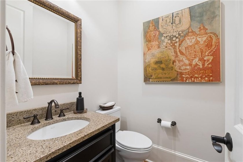 Set behind the gates of One Ivy Walk, this brick townhome offers - photo 22