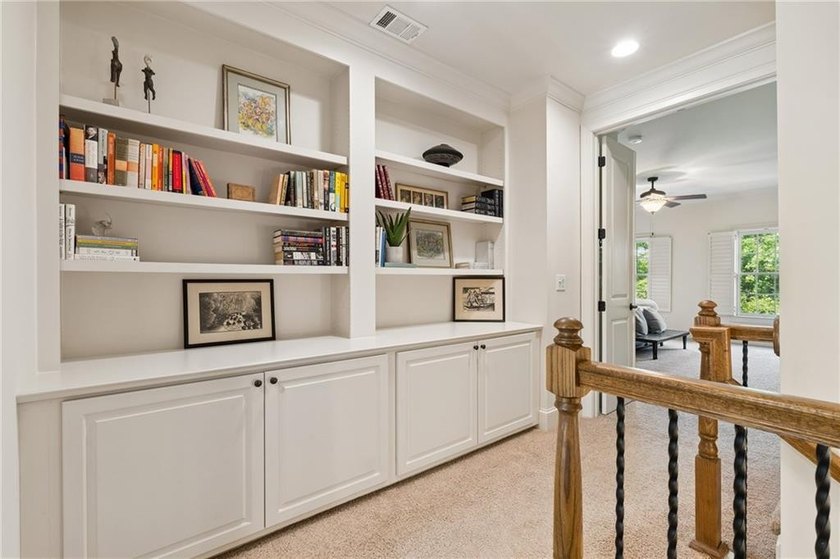 Set behind the gates of One Ivy Walk, this brick townhome offers - photo 23